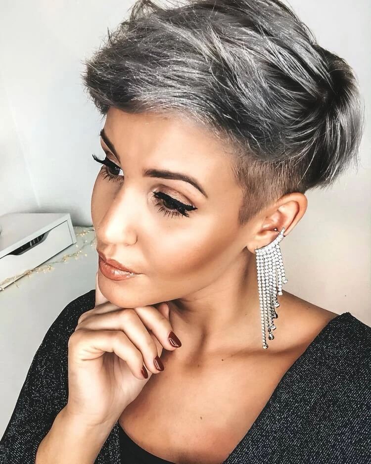 Women's pixie cut on silver hair with shortening