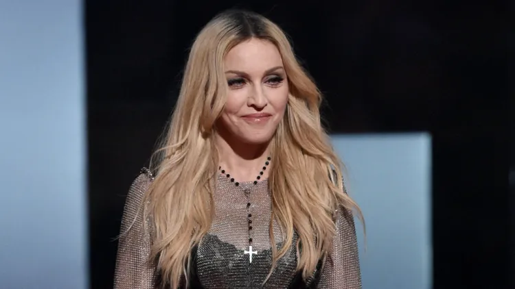 Madonna long hair after 50 years 60 years blonde coloring dark roots .jpg