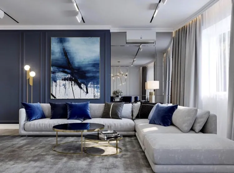 déco salon gris et bleu grand tableau abstrait luminaires tables dorés