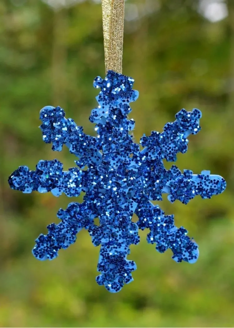 décoration noël écologique flocon de neige en pièces de puzzle