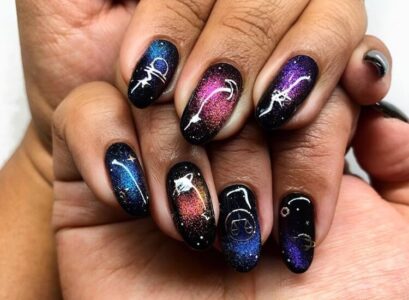 manucure oeil de chat paillettes avec nail art signes du zodiaque