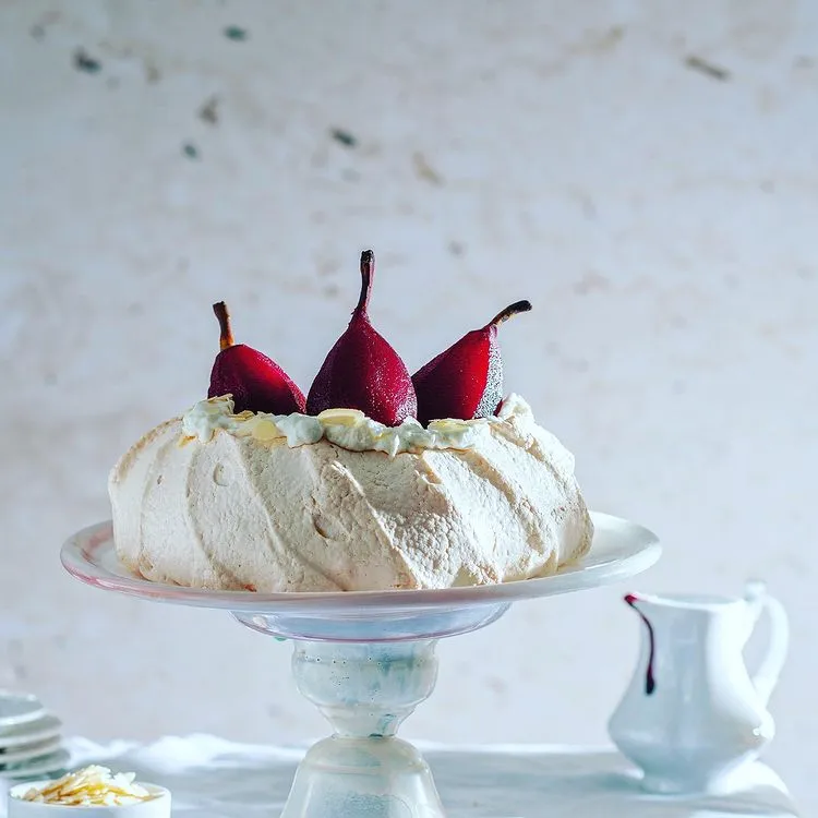 Pavlova with poached pears in hibiscus, from a recent editorial fo