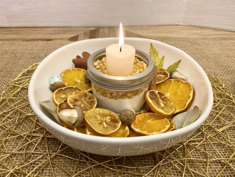 décoration de table avec des matériaux naturels magnifique centre table zeste agrumes citrouille