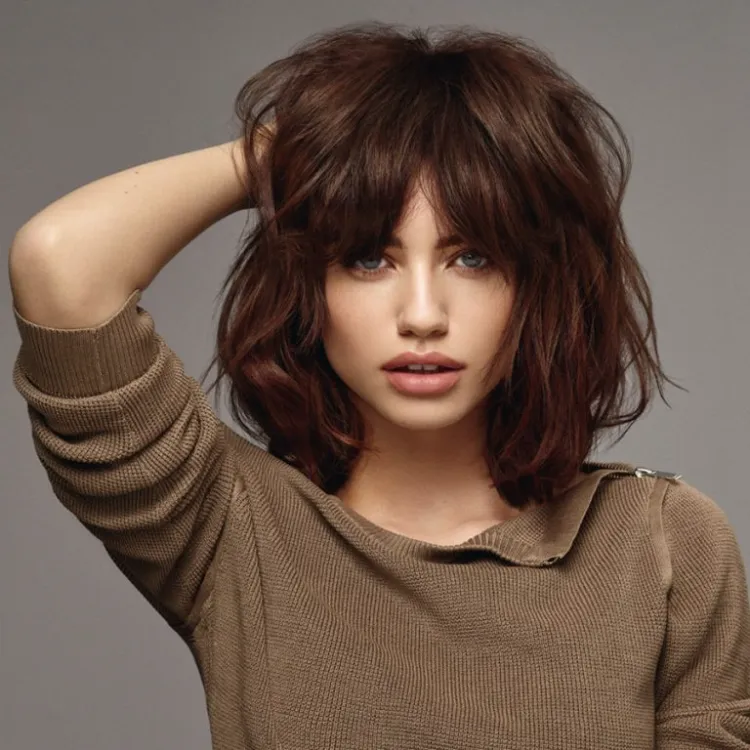 Woman hairstyle idea round shaggy hairstyle volume bangs shaggy