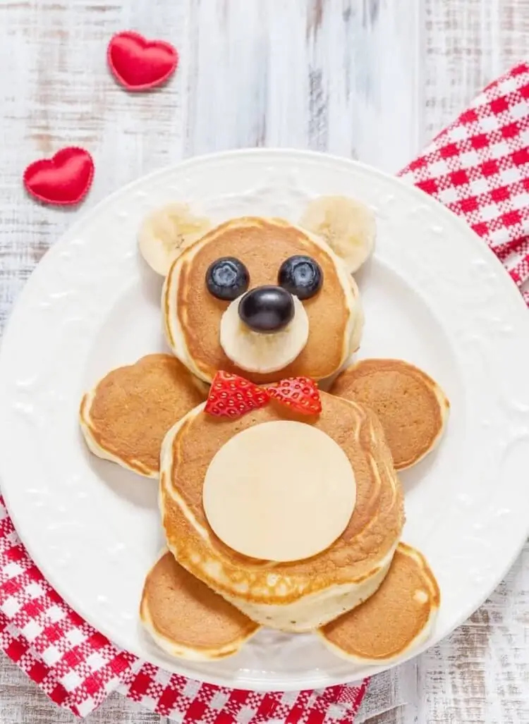 teddy bear made of pancakes with fruits light breakfast idea for kids