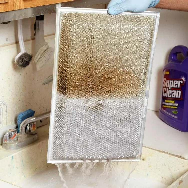 comment nettoyer hotte de cuisine en stainless immerger filtre solution laisser tremper quinze minutes