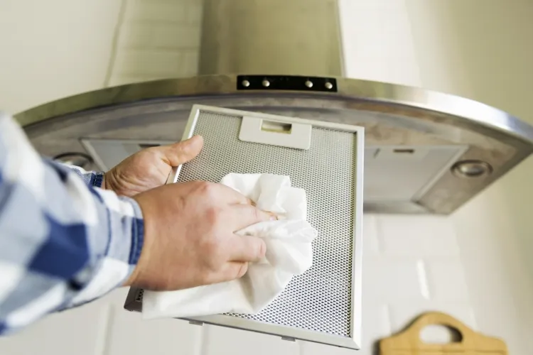 comment nettoyer la hotte de cuisine retirer filtre barrière graisse tremper solution