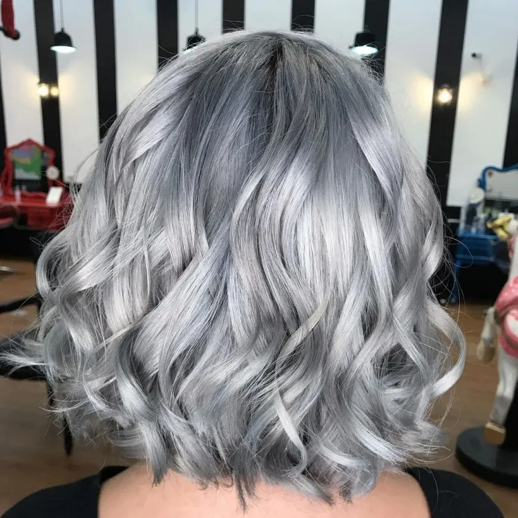 Medium Length Gray Haircut That Highlights Silver