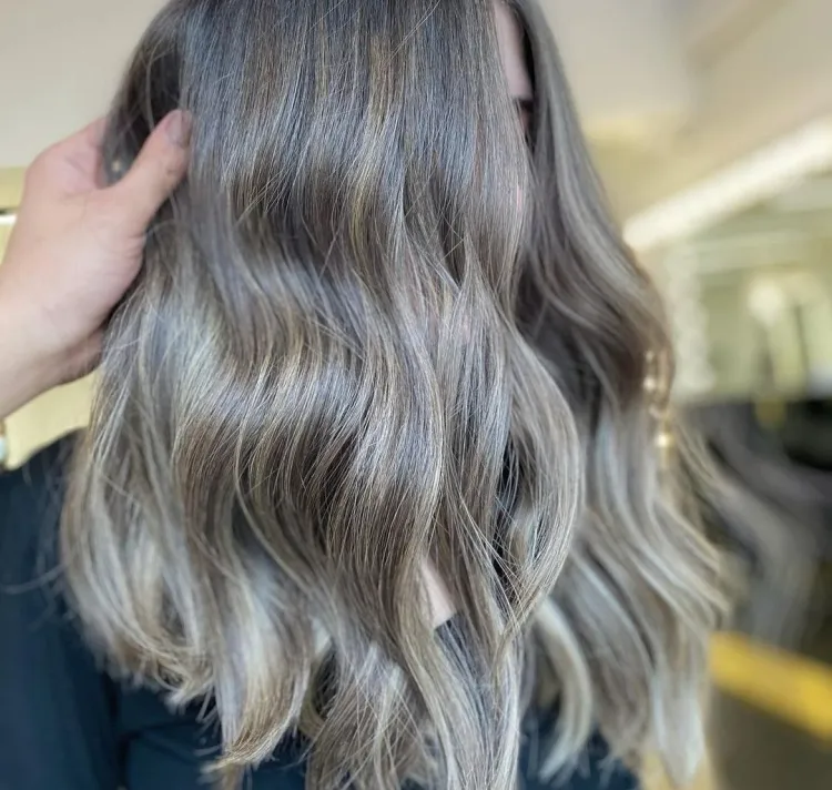 Gray haircut for women over 60 ash blonde color with soft gray highlights