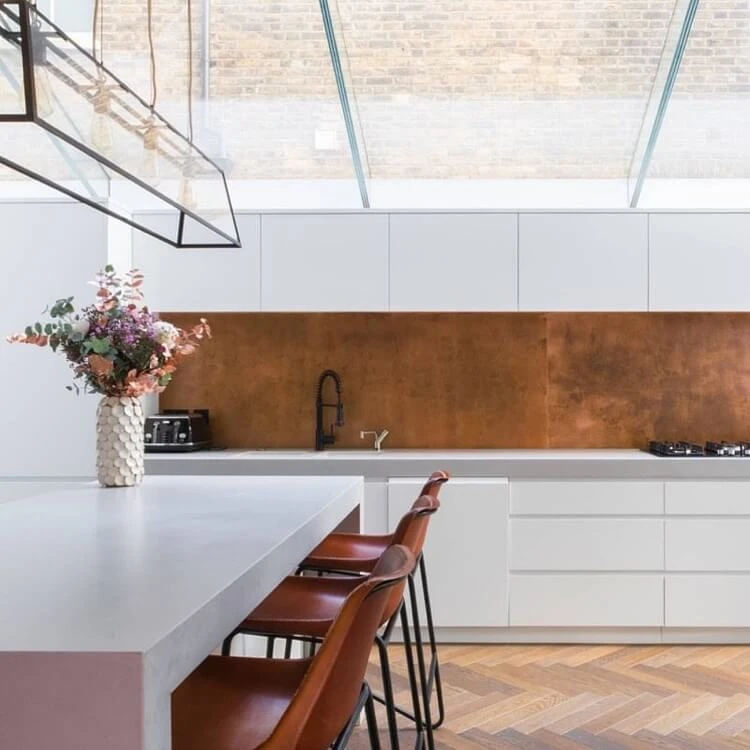 kitchen backsplash trend 2022 copper white cabinets chevron parquet