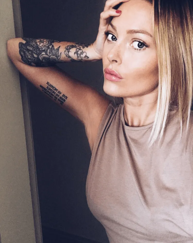 Caroline Receveur tattoo of star famous woman tattooed forearm biceps