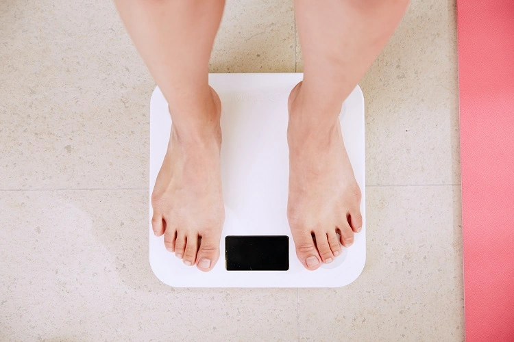 how to lose 5 kg woman on the scale