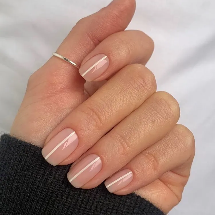 minimalist nail art with a white line