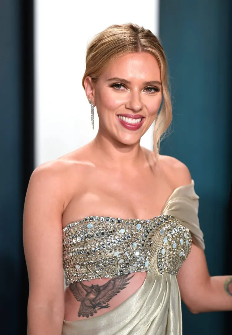 what are the top tattoo of star scarlet johansson owl on the sides