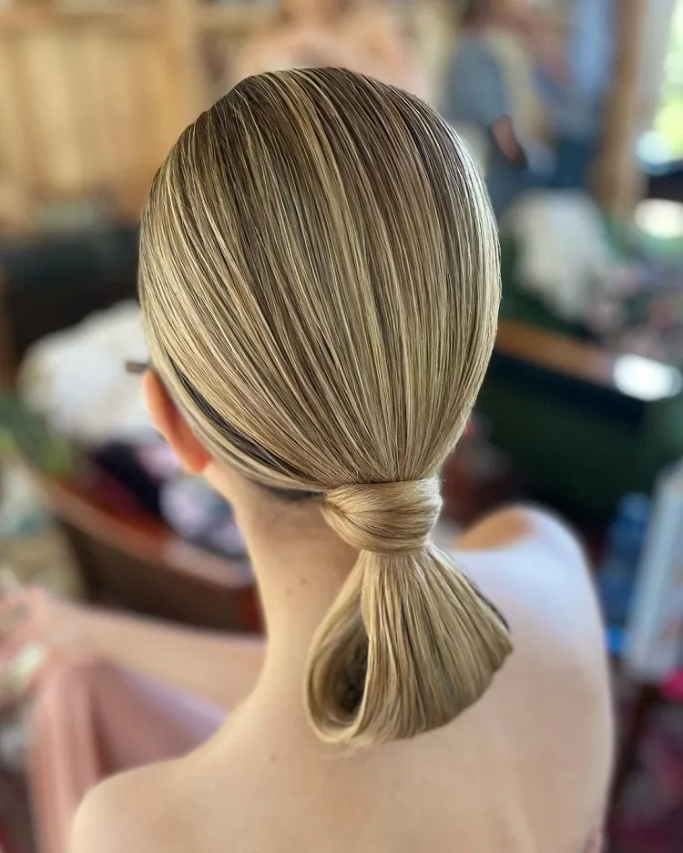 Sleek women's hairstyle for styling when it's hot at home Summer 2022
