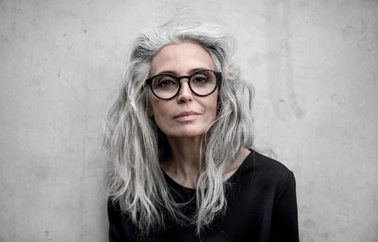 Hairstyle of a 60-year-old woman with glasses
