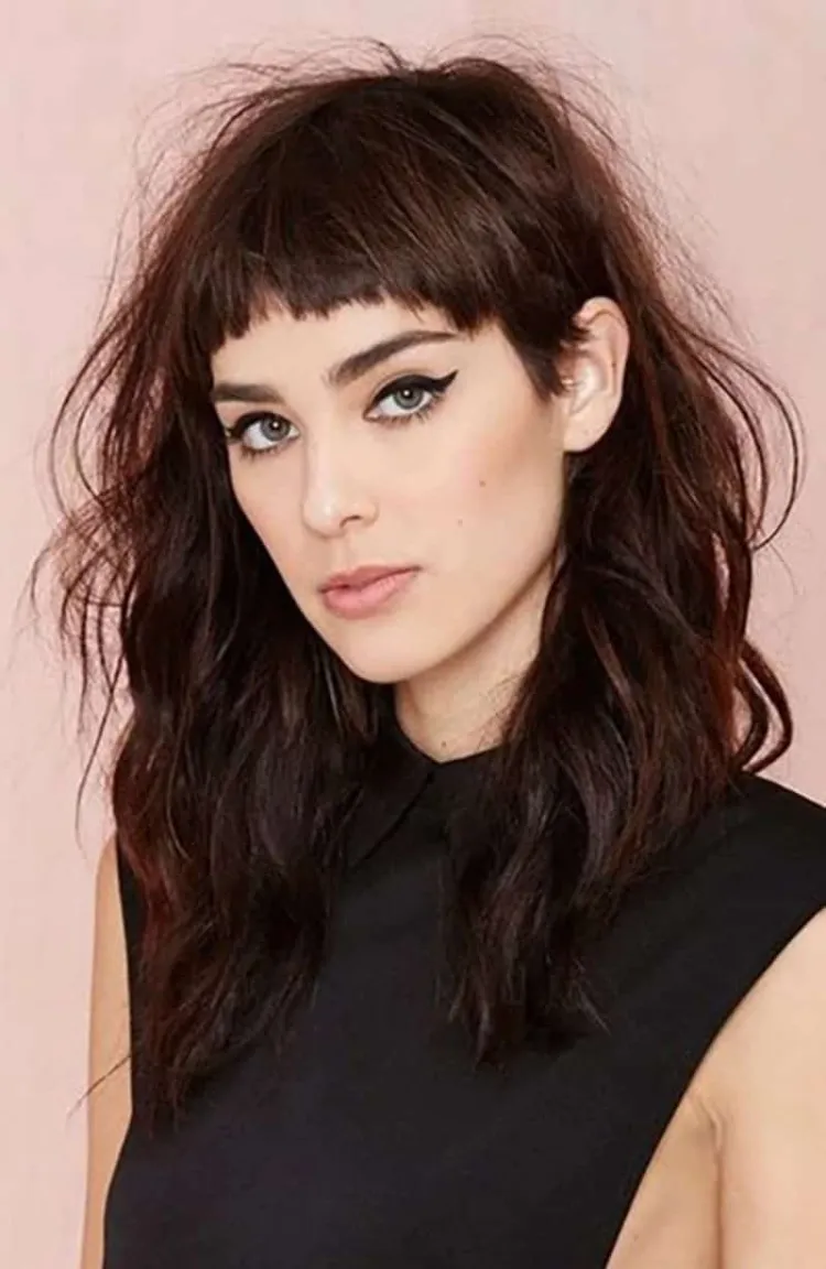 Hairstyles with short bangs summer trend 2022 Long shaggy tousled hair