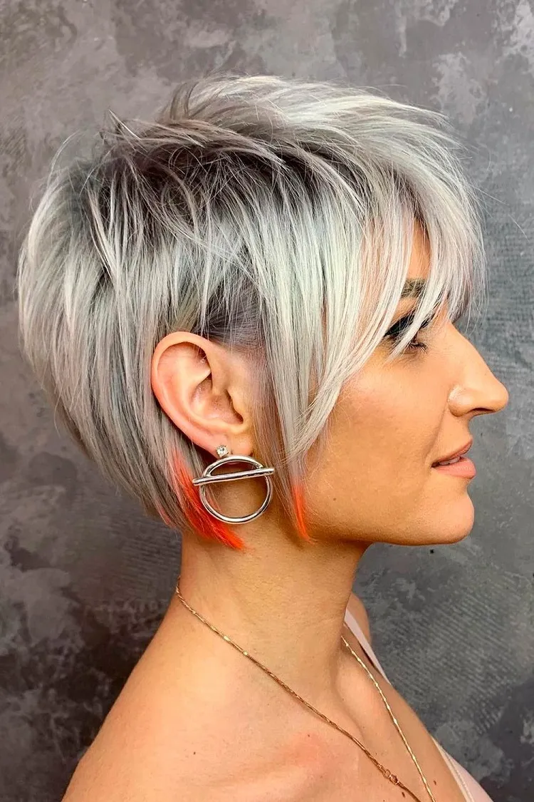 Long tapered pixie cut with orange tips