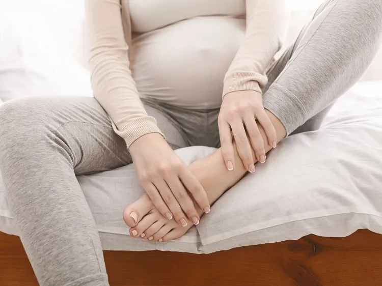 canicule grossesse jambes lourdes femme enceinte été solutions