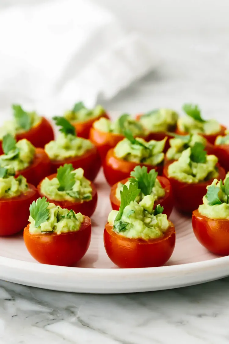 Aperitif recipe summer 2022 cherry tomatoes stuffed with parsley guacamole