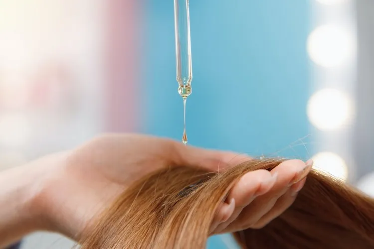 natural hair care oil repair hair in autumn with argan oil