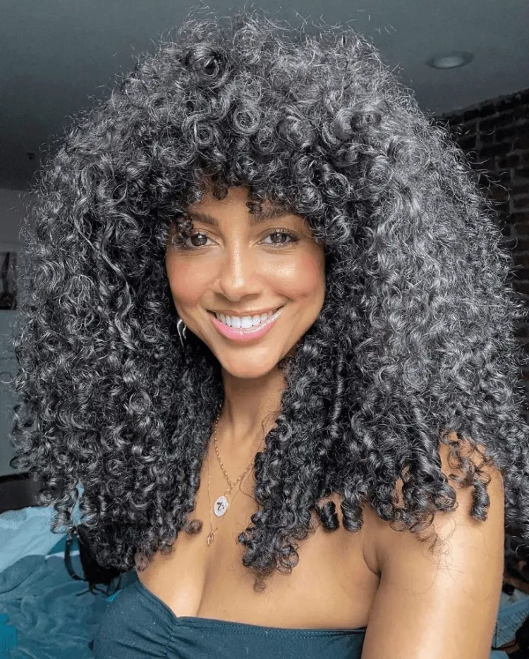 wolf cut long curly wavy hair woman afro hairstyle trend fall winter 2022