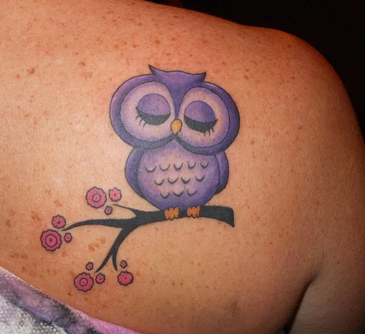colorful owl animal tattoo on back