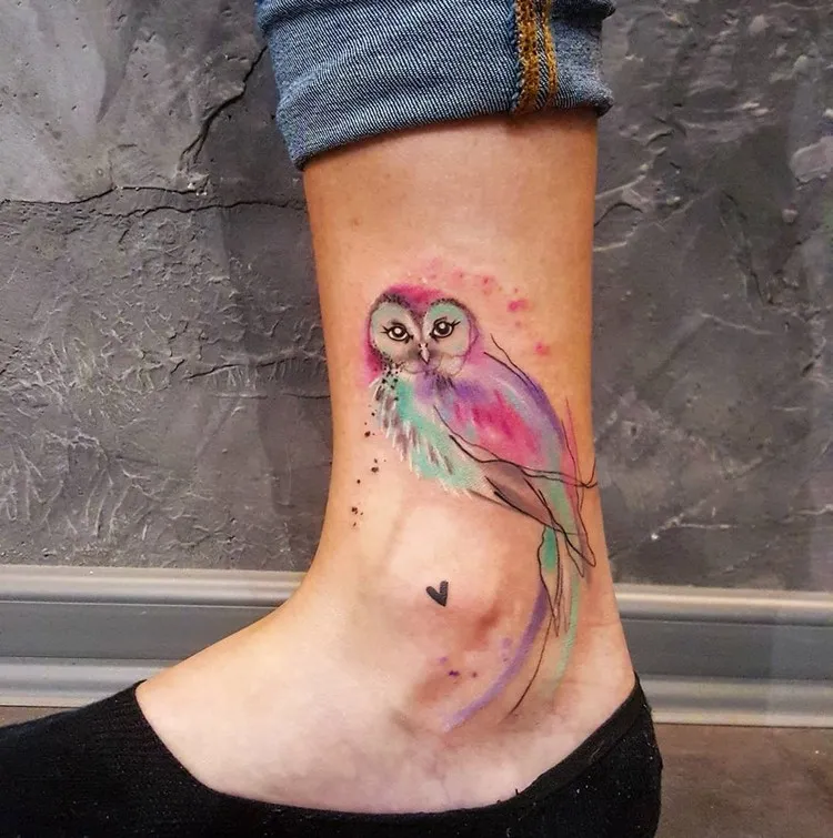 watercolor minimalist owl tattoo on ankle