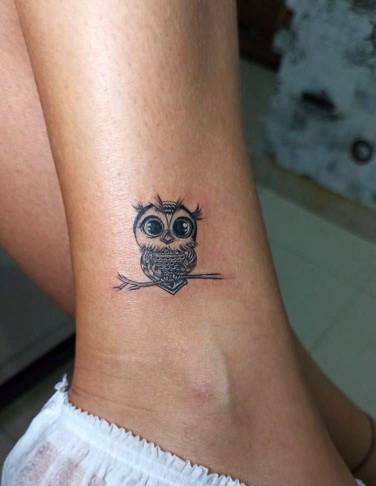 minimalist owl tattoo on the ankle idea small discreet tattoo woman trend