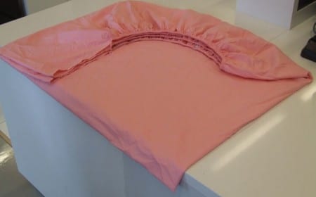 comment plier un drap housse correctement