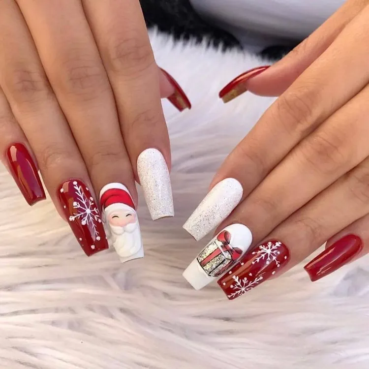 mancure Père Noël cadeaux et flocons de neige nail art rouge et blanc
