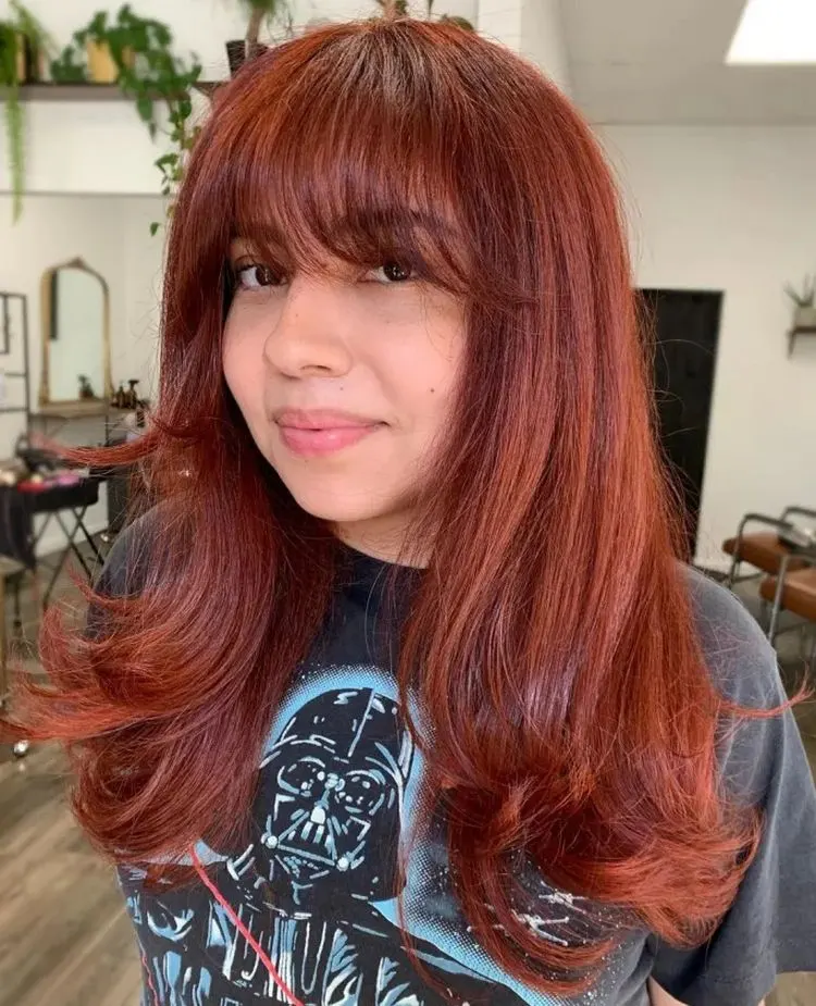 hairstyle with bangs for round face long red hair