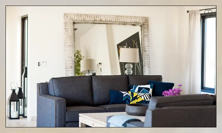 how to decorate the wall above the sofa bed living room mirror