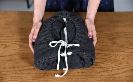 comment plier ses pulls pour gagner de la place dans une valise ou un placard astuces gain de place pliage dressing organisé