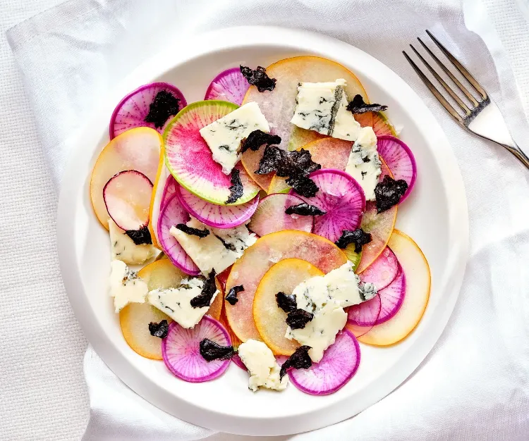 Winter salad recipe consists of radish pear blue cheese nori sheet vinaigrette