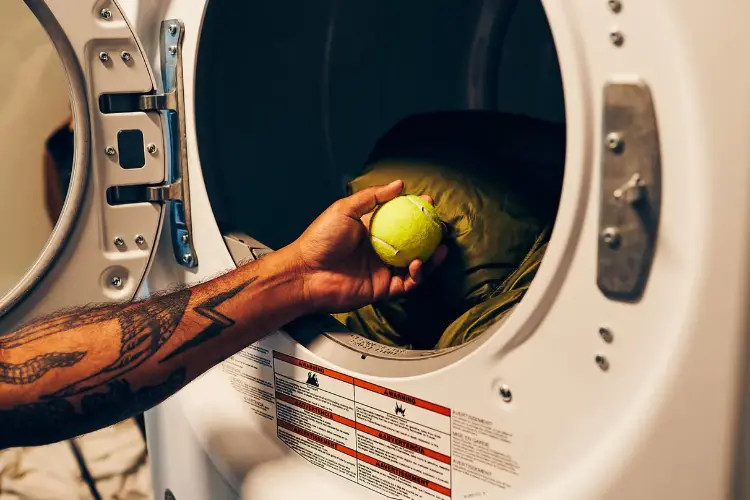 comment laver doudoune duvet en machine faire sécher balles de tennis