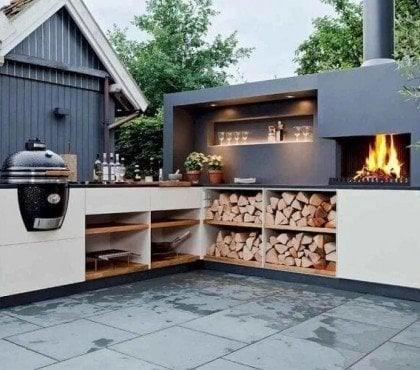 cuisine extérieure moderne avec barbecue oeuf cheminée rangement bois