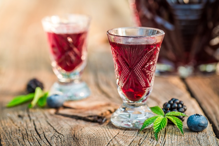 healthy liqueur with alcohol and berry fruits