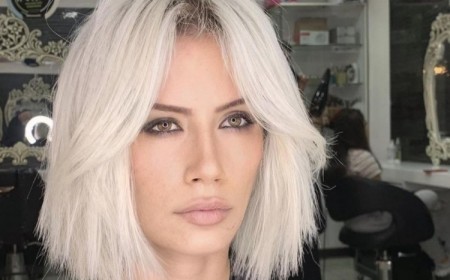 frange rideau pour la rentrée 2023 cheveux courts carré blond