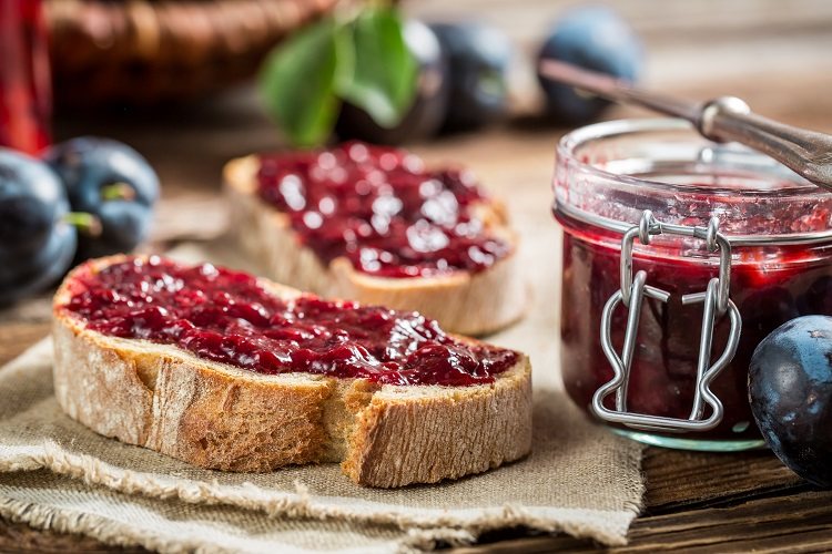 closeup of sandwich with fresh plum jam