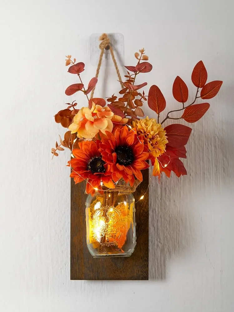 décoration murale d'automne diy guirlande lumineuse dans un bocal feuilles mortes vase bouquet fleurs séchées