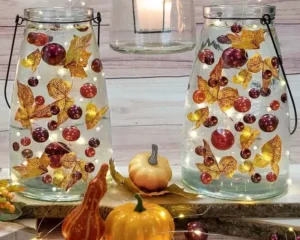 idées déco bocaux en verre décoration d'automne diy facile et originale guirlandes lumineuses led feuilles mortes citrouilles