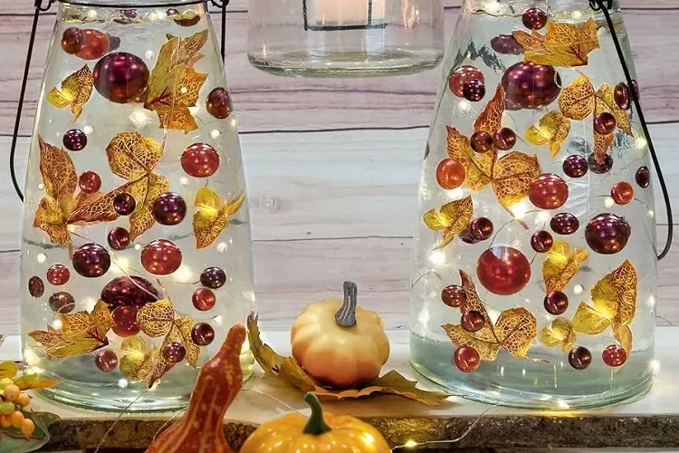 idées déco bocaux en verre décoration d'automne diy facile et originale guirlandes lumineuses led feuilles mortes citrouilles