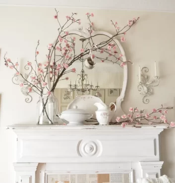 décoration avec des branches d'arbres fleuries manteau de cheminée shabby chic