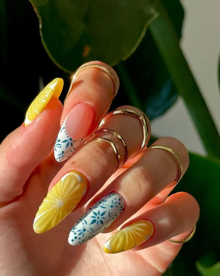 nail art agrumes sur des ongles longs pour célébrer l'été 2024