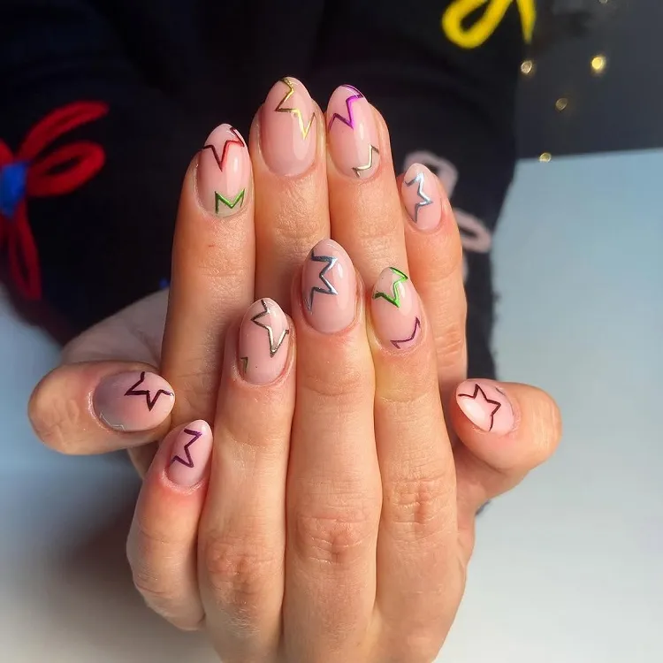 Nail art Réveillon Nouvel An avec des étoiles