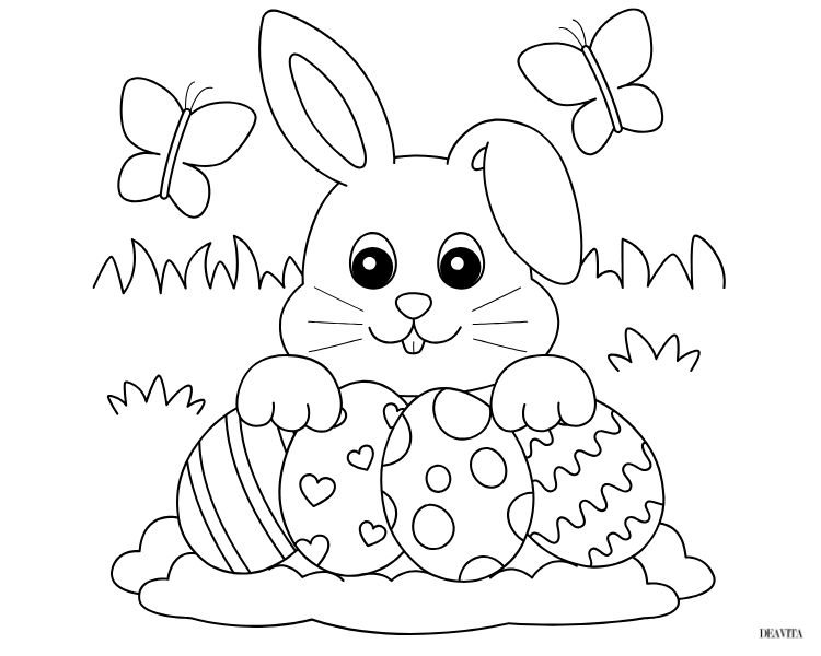 un lapin mignon qui se cache derrière des œufs décorés