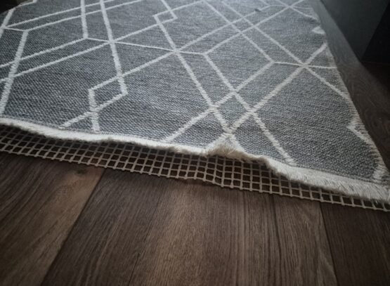 sous tapis antidérapant pour empêcher le tapis de s'enrouler