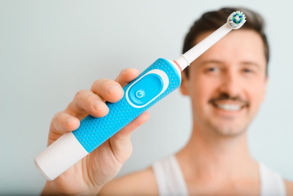 vous utilisez une brosse à dents électrique