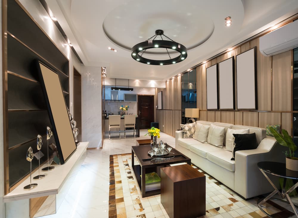 luminaire statement circulaire noir avec spots intégrés éclairage moderne et homogène